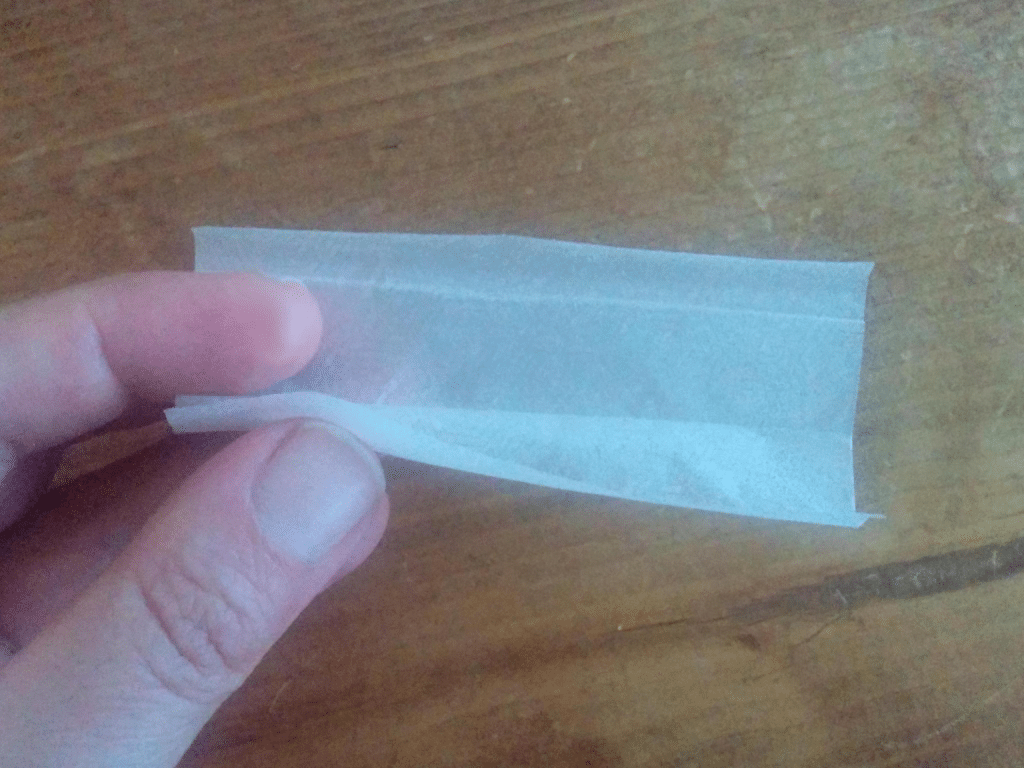 How to fold the rolling paper to roll a joint.